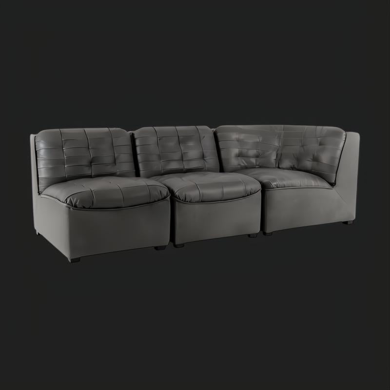Surya Oryan RYAN-005 black 100% leather modular sofa with structured, tufted cushions.
