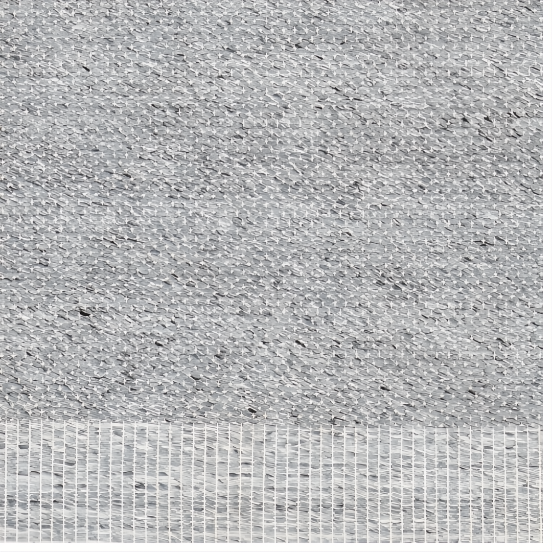Hand-woven gray and white recycled PET yarn area rug with a subtle, textured pattern.
