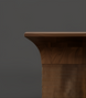 Surya Langford brown mango wood end table with a lacquered finish and textured base.