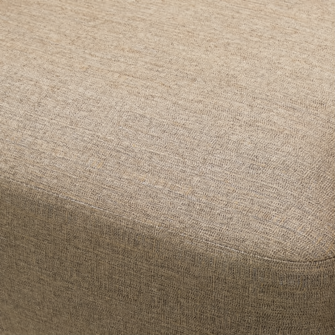 Close-up of a beige Sunbrella® acrylic cushion with a textured weave.