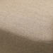Close-up of a beige Sunbrella® acrylic cushion with a textured weave.