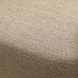 Close-up of a beige Sunbrella® acrylic cushion with a textured weave.