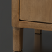 Close-up of the Surya Silas Cabinet's brown stained mango wood leg and base, showcasing its Scandinavian modern design.