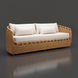 Surya Marvella indoor/outdoor sofa with light beige cushions and a woven wicker-style base.
