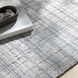 Surya Fresno FNO2304 light gray recycled PET yarn area rug with subtle geometric texture.