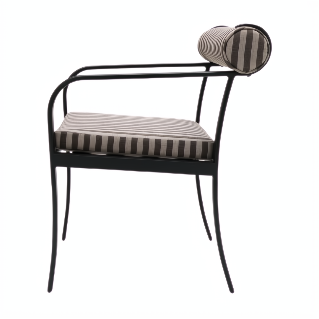 Surya Antibes dining arm chair with black aluminum frame and multi-color striped Sunbrella cushions.