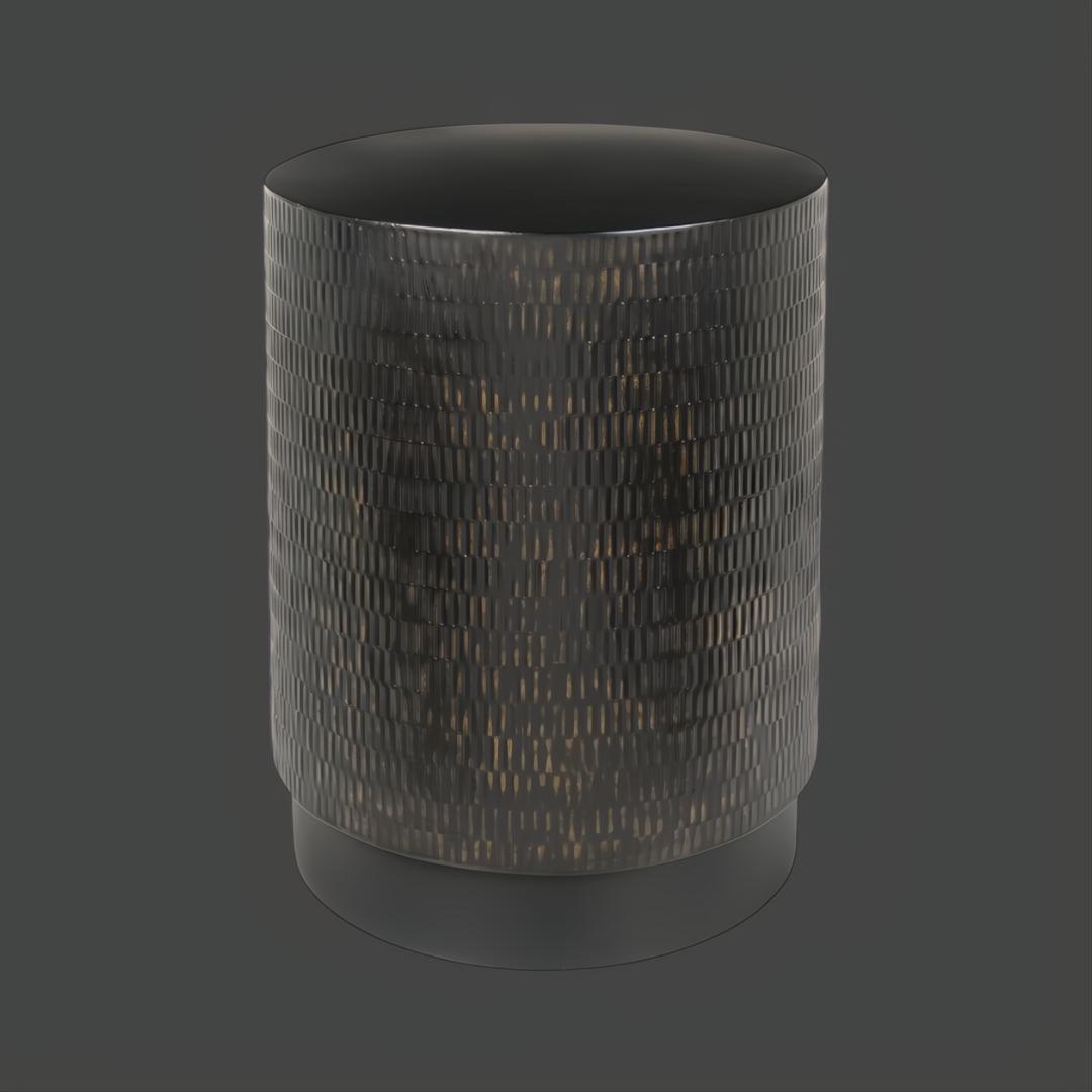 Black iron Surya Amenet End Table with hammered detailing and a compact round design.