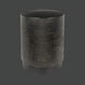 Black iron Surya Amenet End Table with hammered detailing and a compact round design.
