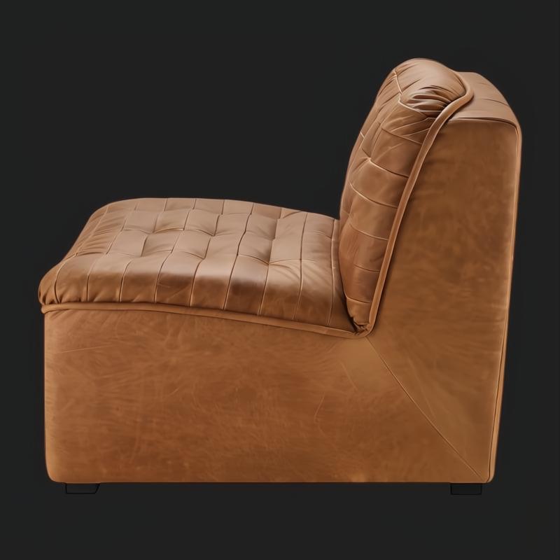 Surya Oryan RYAN-001 modular chair with brown leather upholstery, tufted seat, and black base.