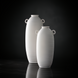 Surya Kushan cream ceramic decorative vase set with textured finish and loop handles.