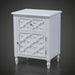 White Daintree Side Table with decorative drawer and cabinet, compact and versatile design.