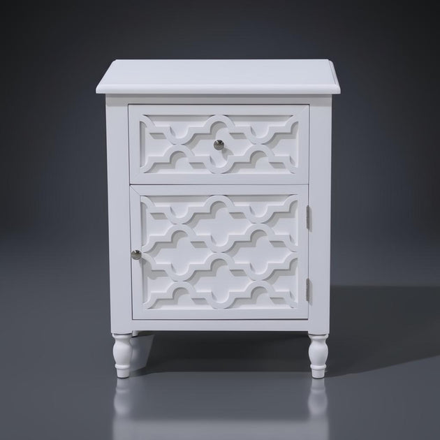 White Daintree Side Table with a decorative geometric drawer and cabinet, perfect for bedside or accent use.