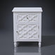 White Daintree Side Table with a decorative geometric drawer and cabinet, perfect for bedside or accent use.