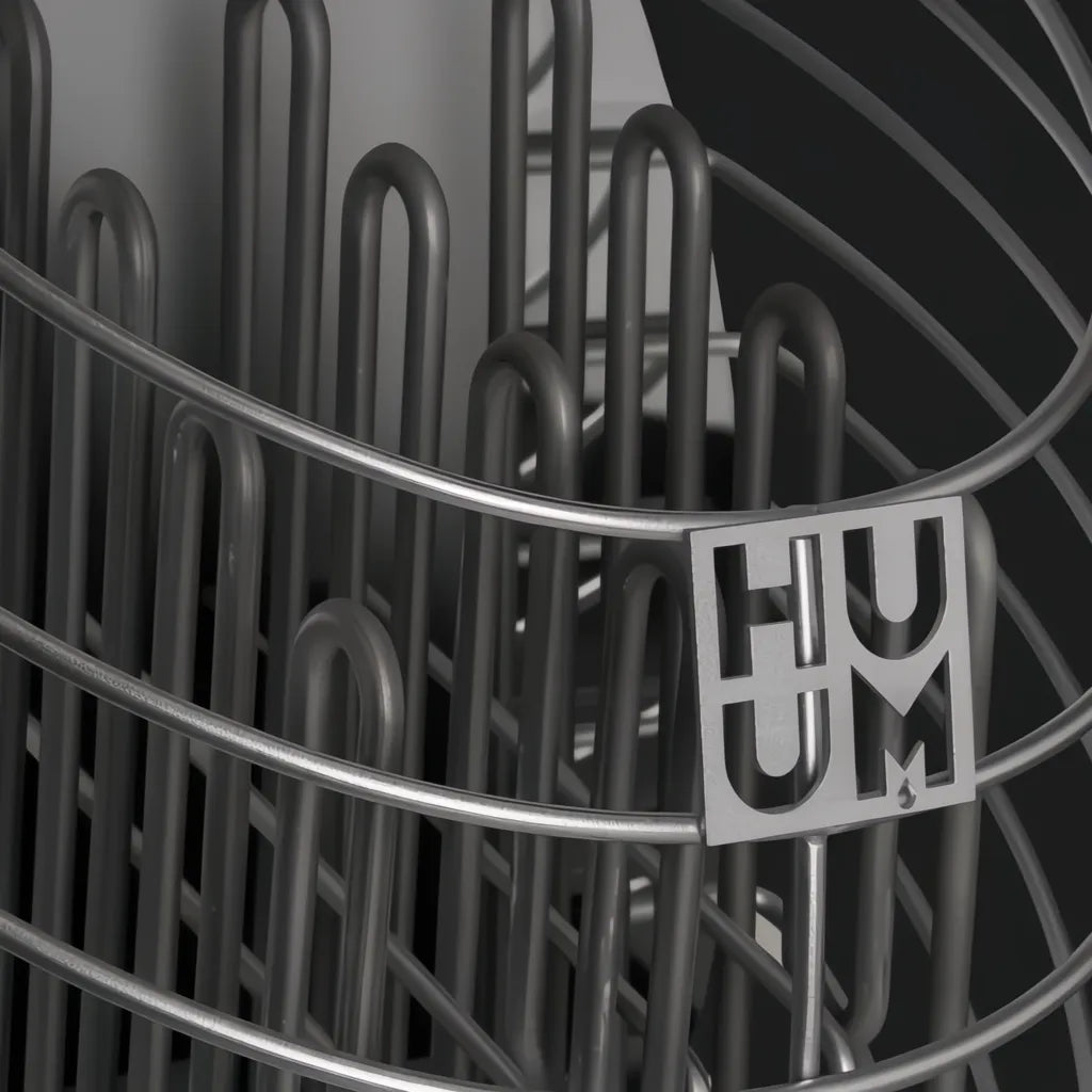 Close-up of a Huum Drop 9KW sauna heater add-on, featuring a sleek silver metal coil design.