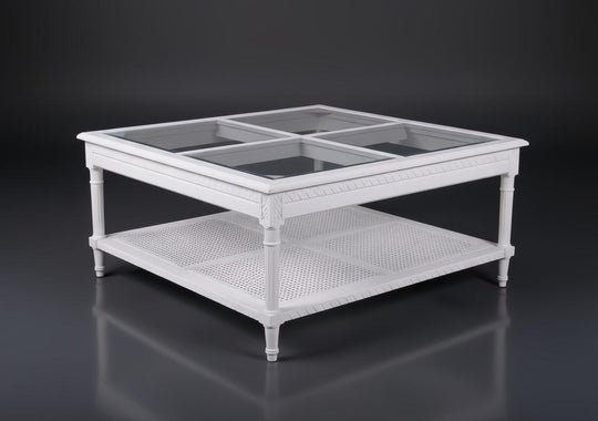 White Polo Square Coffee Table with glass top and cane shelf, featuring coastal elegance.