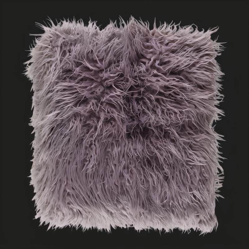 Soft, shaggy gray Kharaa throw blanket with a modern woven texture, made from an acrylic and polyester blend.