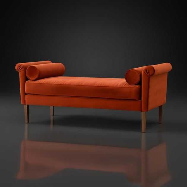 Surya Aneesa Bench with rust upholstery, brown rubber wood base, and bolster pillows.