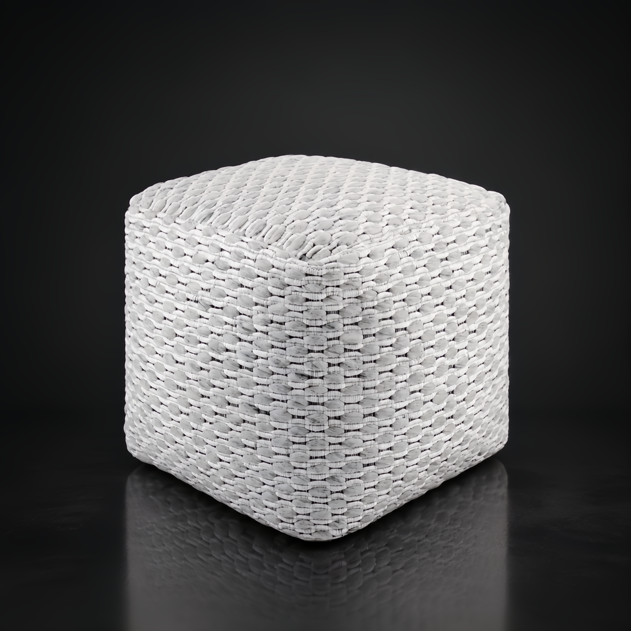 White woven cube pouf with wool top, stitched detailing, and self-binding edge.