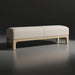 Light beige polyester Surya Bradly Bench with a beige stained red oak base and clean, versatile design.