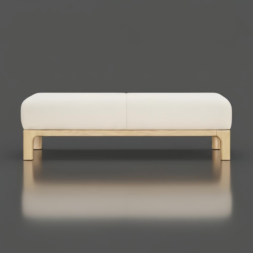 Light beige polyester bench with a simple, polished design and a beige stained red oak base.