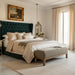 Surya Bradly Bench with olive polyester upholstery and brown-stained red oak base in a bedroom setting.