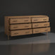 Surya Hermosa 72" wide brown painted oak veneer dresser with six drawers, some open, and metal pulls.