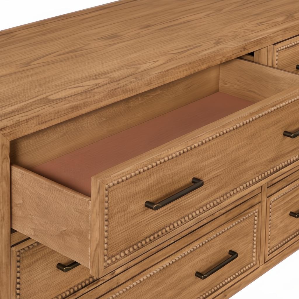 Brown painted oak veneer dresser with an open, felt-lined top drawer and dark bronze handles.