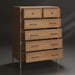 Brown painted oak veneer dresser with six drawers, two top drawers slightly open, and decorative trim.
