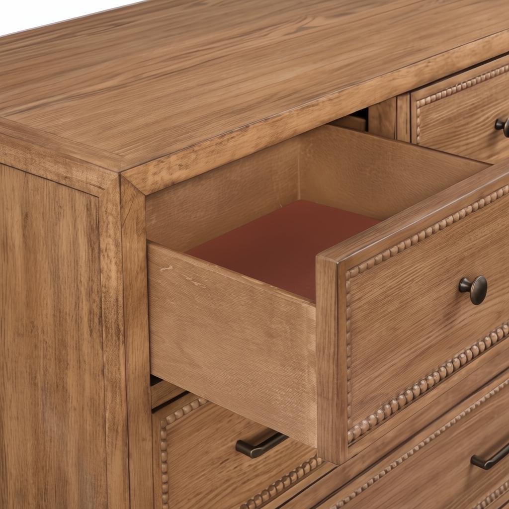 Brown painted oak veneer dresser with an open, felt-lined top drawer and beaded trim.