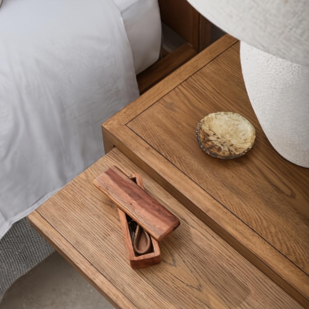 Surya Hermosa brown natural nightstand with a pull-out shelf, made from rubber wood and oak veneer.