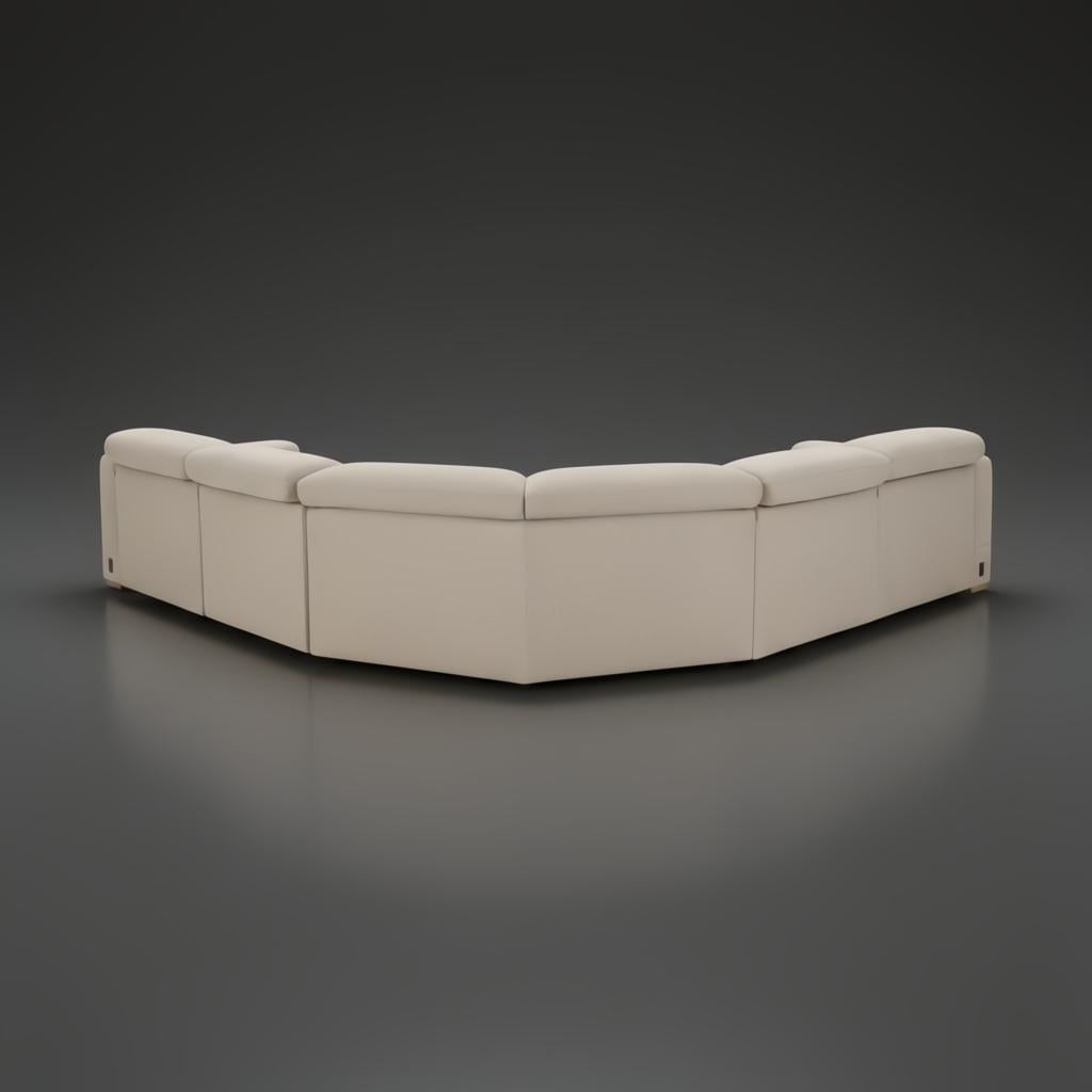 Surya Lloyd Power Sectional, a light beige polyester sectional sofa with a brown stained plywood base.
