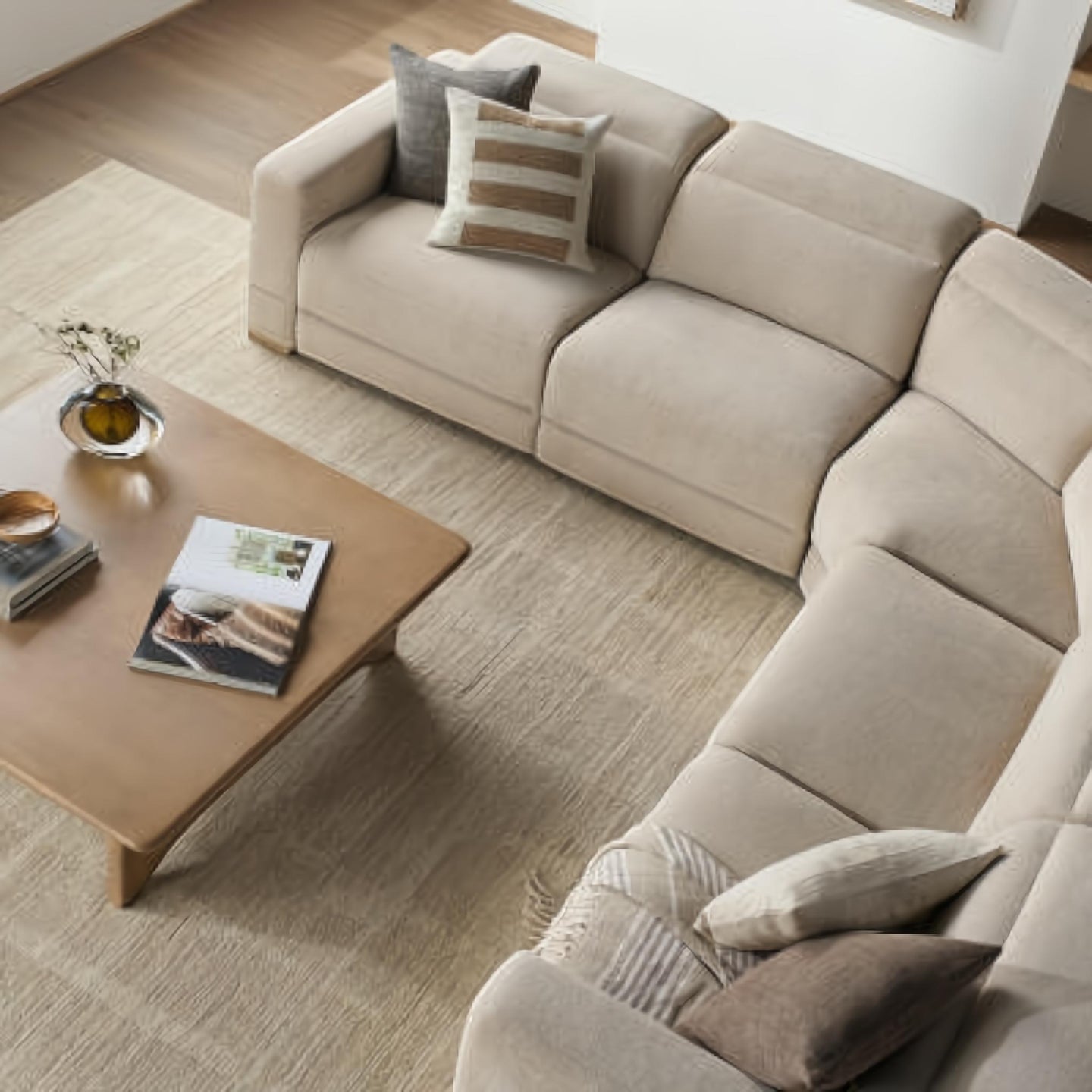Surya Lloyd Power Sectional: Beige polyester sectional sofa with power recline, brown plywood base, and throw pillows.