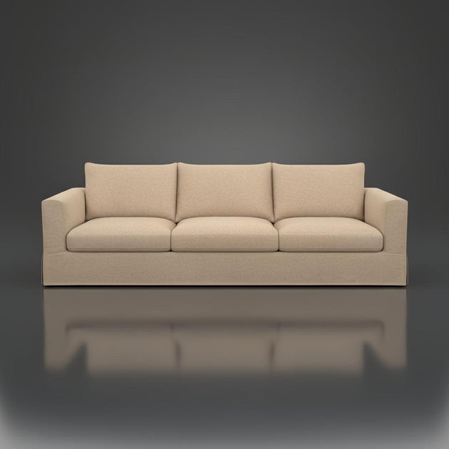 Surya Braydee sofa, 99" wide, with three plush cushions and a clean, relaxed brown polyester finish.