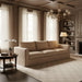 Surya Braydee brown polyester sofa with a clean, relaxed design in a living room setting.