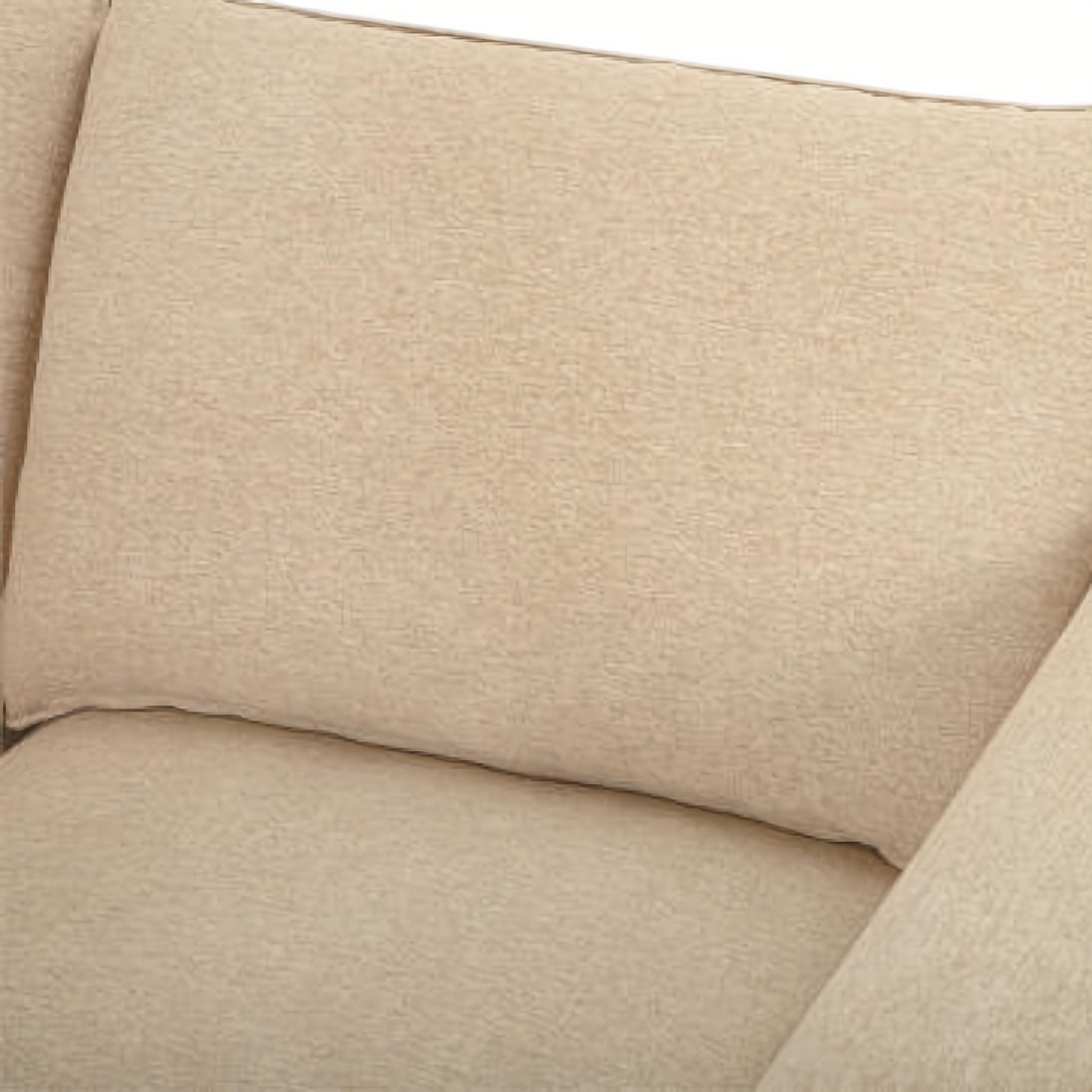 Close-up of a textured beige polyester sofa cushion, showing its plush, inviting surface.