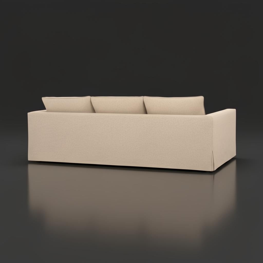 Rear view of a light brown Surya Braydee sofa with three back cushions and a clean, relaxed design.