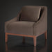 Surya Casey accent chair with dark brown recycled fabric upholstery, plush cushion, and rubber wood base.