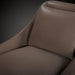 Close-up of a brown Surya Casey Accent Chair with recycled fabric upholstery and plush polyurethane foam fill.