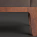 Close-up of a Surya Casey accent chair with dark brown recycled fabric upholstery and a rich brown rubber wood base.