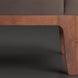 Close-up of a Surya Casey accent chair with dark brown recycled fabric upholstery and a rich brown rubber wood base.