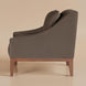 Surya Casey accent chair with dark brown recycled fabric upholstery and a rubber wood base.