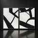 Two framed black and white abstract wall art pieces with bold lines, hand-painted on canvas.