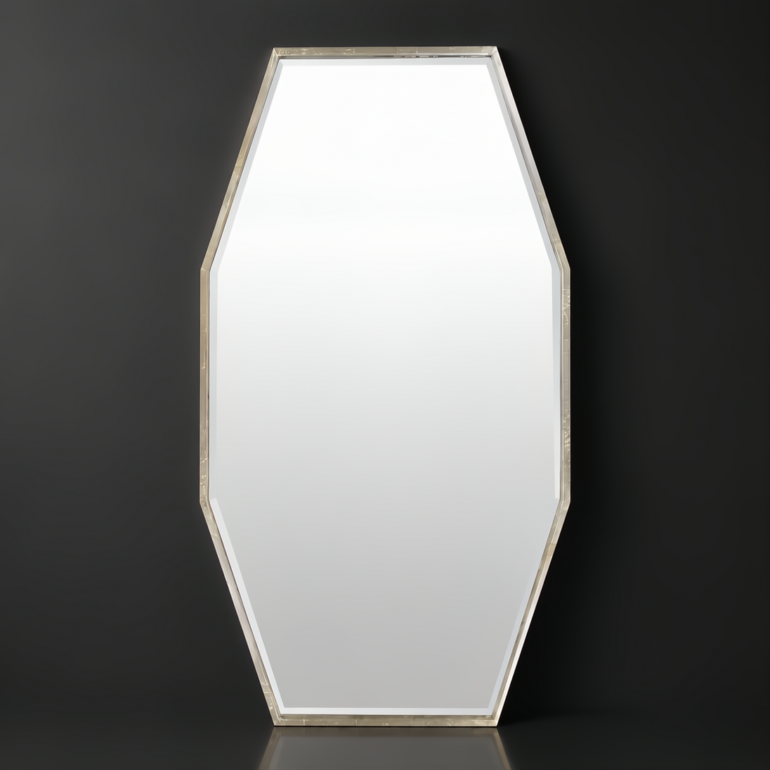 Elongated octagonal wall mirror with a gilded metallic silver iron frame and beveled glass.