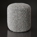 Light grey textured Surya Mohave pouf with a durable polyester top and soft cotton base.