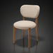 Surya Devin Dining Chair with cream polyester upholstery and a wheat-colored beechwood base.