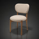 Surya Devin Dining Chair with cream polyester upholstery and a wheat-colored beechwood base.