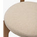 Surya Devin Dining Chair with cream polyester upholstery and a wheat-colored beechwood base.