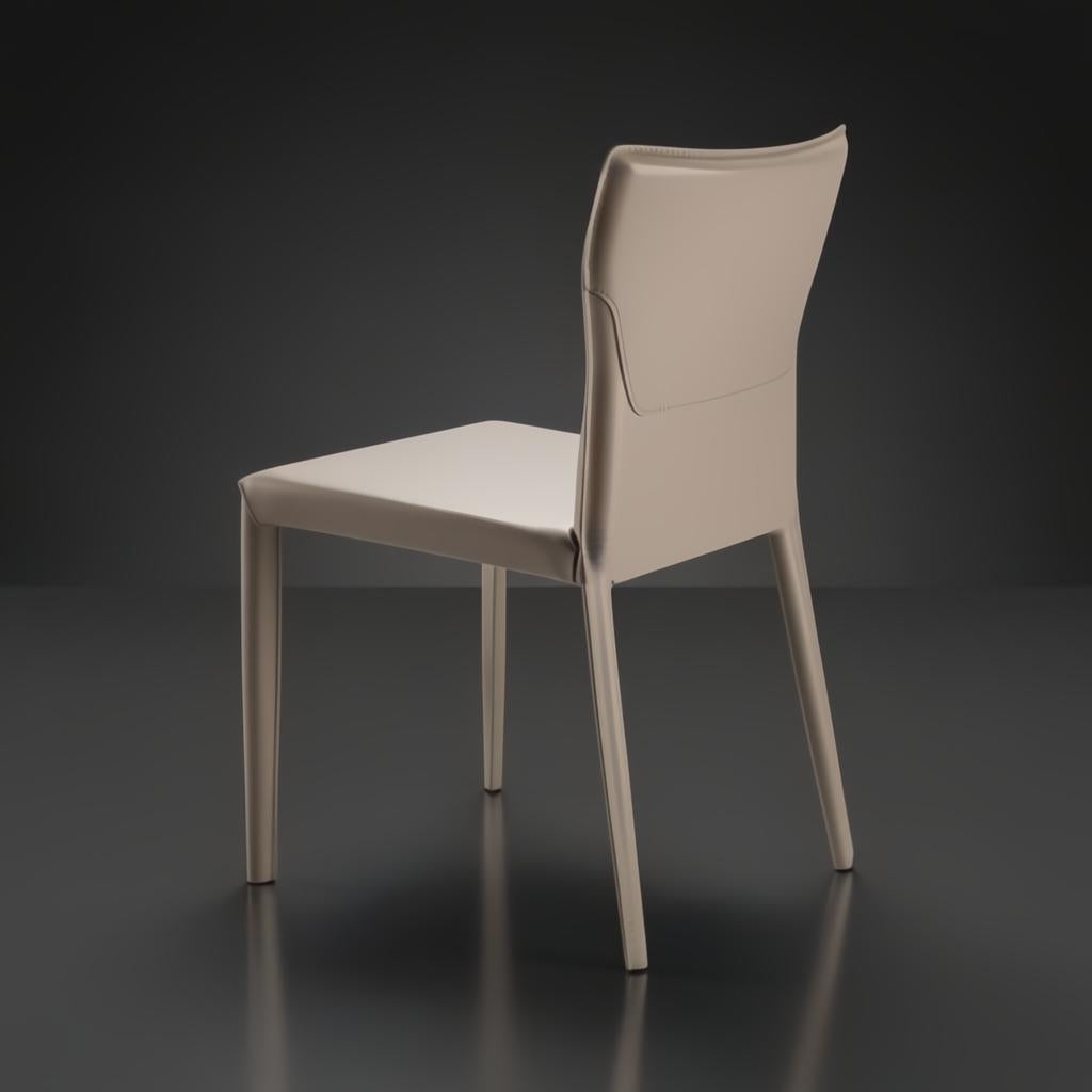 Surya Eric Dining Chair with light brown PVC upholstery and khaki iron base, shown from the back.