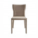 Surya Eric Dining Chair with light brown PVC upholstery and khaki iron base.