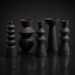 Surya Konark KNK-001 black ceramic vase set, five global-inspired decorative accents with varied shapes and textures.